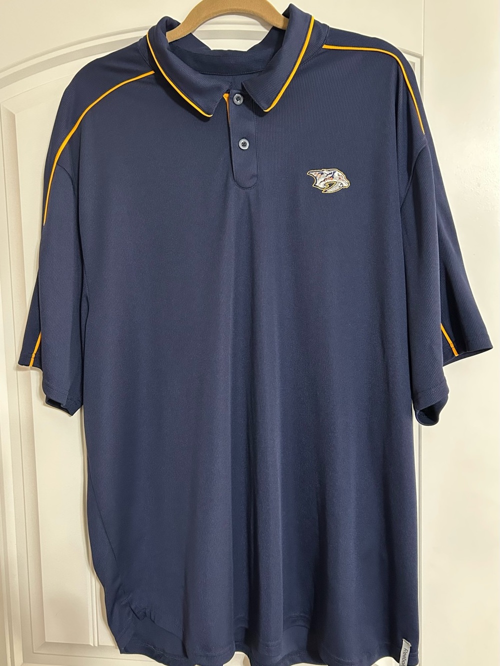 Reebok Navy Nashville Predators Polo with Yellow Piping and Embroidered Logo